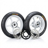 2 12" White Supermotos with black sprocket and 2 rotors