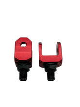 Load image into Gallery viewer, Two red metal brackets with black screws on a gray background
