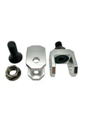 Metal components including a bolt, nut, and two metal brackets on a white background