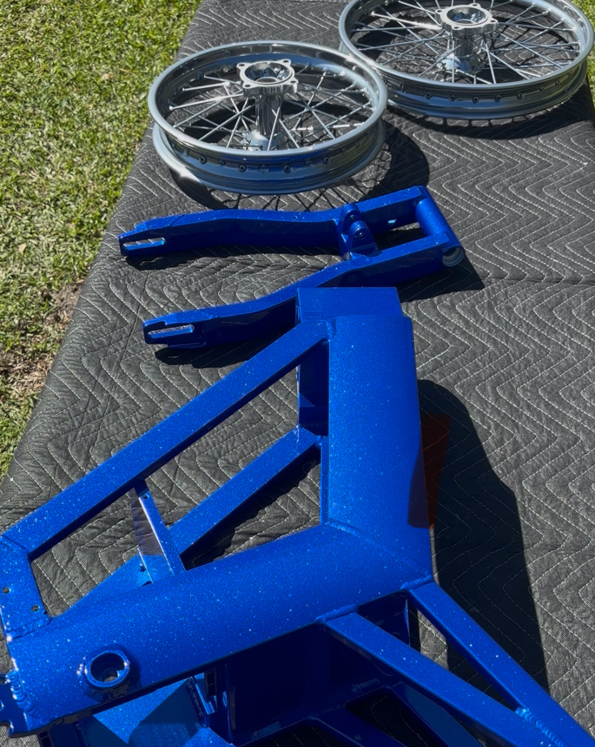 K. Mods custom powder-coated electric dirt bike parts